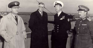 Norman on board a warship with Canadian, UN and Egyptian military leaders during the Suez Crisis