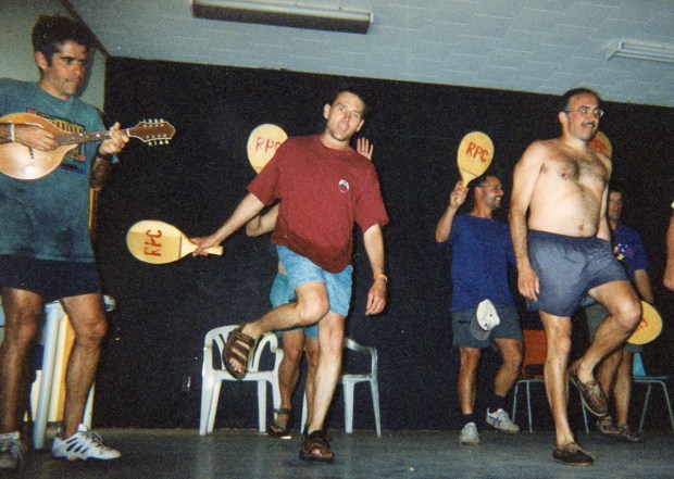 Paddle tennis meets Riverdance: that's me (on mandolin), Randy in red, and Michel beside him, inexplicably shirtless.